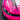 Close-up of a car with a pink and black design on a dark surface